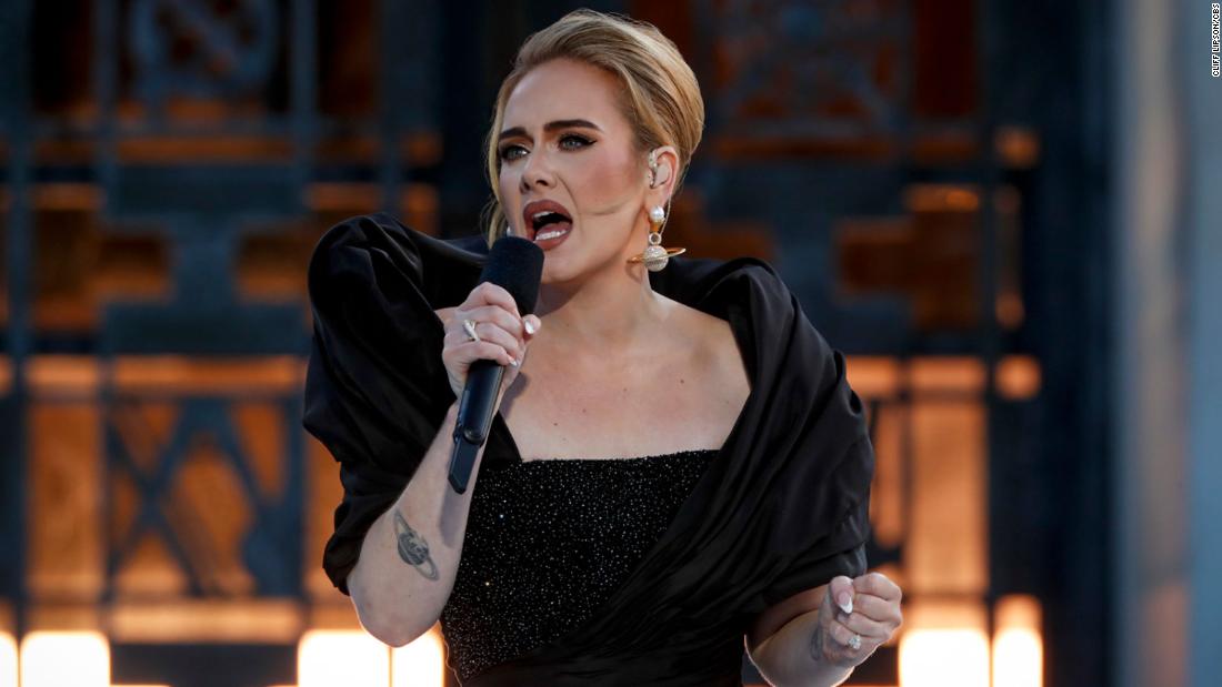 Tearful Adele announces postponement of Las Vegas residency