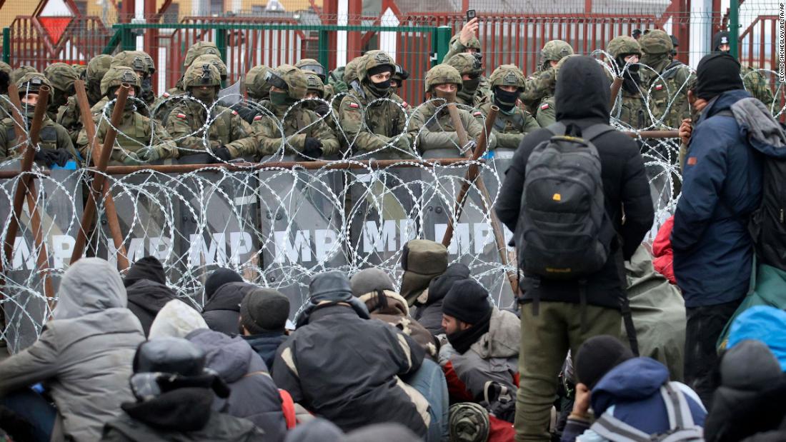 Violence erupts on Poland-Belarus border as Polish guards fire water cannon on migrants throwing rocks