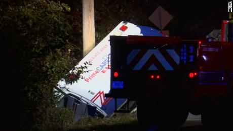 The ambulance veered off the shoulder of the road causing it to roll over into a ditch in Fairburn, Georgia, police said.