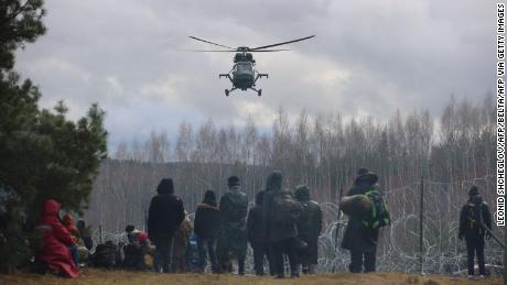 A picture taken on November 8, 2021 shows migrants at the Belarusian-Polish border in the Grodno region.