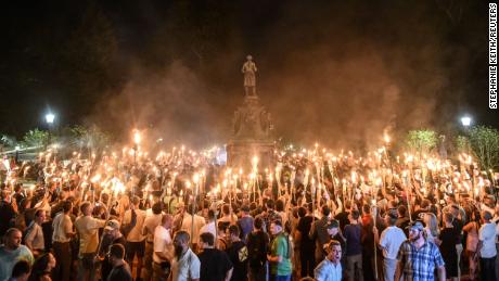 White nationalists participate in a torch-lit march on the grounds of the University of Virginia ahead of the Unite the Right Rally in Charlottesville, Virginia on August 11, 2017. Picture taken August 11, 2017.  REUTERS/Stephanie Keith