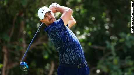 Koepka plays his shot from the seventh tee in the second round of the World Tech Championship in Mayakoba.