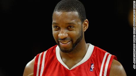 OAKLAND, CA - DECEMBER 12: Tracy McGrady #1 of the Houston Rockets smiles during the game against the Golden State Warriors on December 12, 2008 at Oracle Arena in Oakland, California. The Rockets won 119-108. NOTE TO USER: User expressly acknowledges and agrees that, by downloading and or using this photograph, User is consenting to the terms and conditions of the Getty Images License Agreement. (Photo by Jed Jacobsohn/Getty Images)