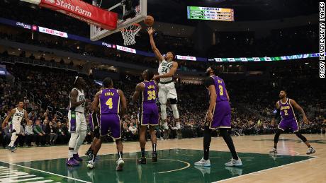 Antetokounmpo shoots over the Lakers&#39; Dwight Howard during the first half.