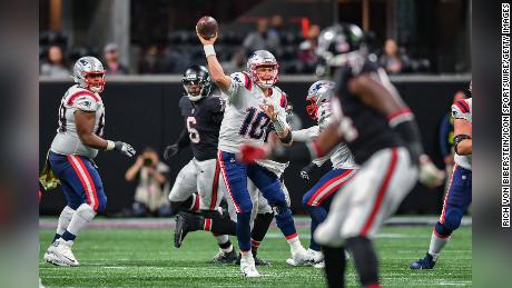 Mac Jones throws a pass during the game between the New England Patriots and the Atlanta Falcons.