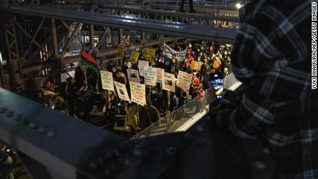 Demonstrators on the  Brooklyn Bridge Friday. 