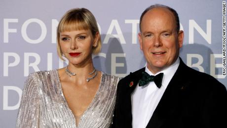 Prince Albert II and Princess Charlene pose on the red carpet ahead of the Monte-Carlo Gala for Planetary Health in Monaco in September 2020. 