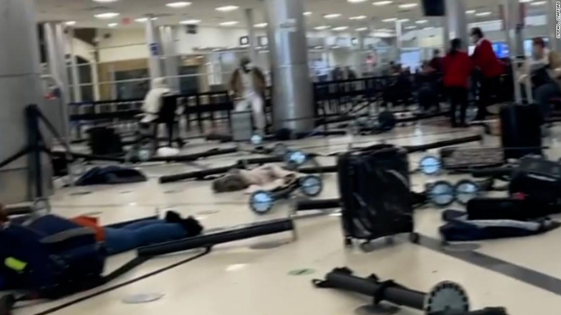 Accidental weapon discharge causes panic at one of the world's busiest airports