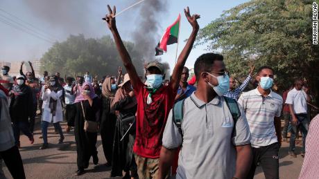 Sudanese protesters rally against the military takeover in Khartoum, Sudan, Sunday, November 21, 2021. 