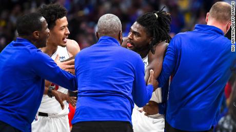 Detroit Pistons and Cade Cunningham Head Coach Dwane Casey #2 reassures Isaiah Stewart #28 after Stewart gets hit by LA Lakers & #39;  LeBron James in a game on Sunday