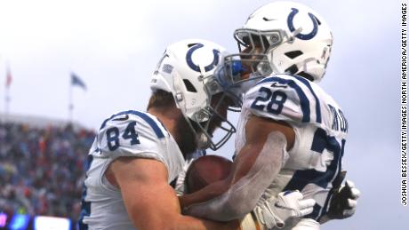 Taylor celebrates a touchdown with Jack Doyle during the third quarter against the Bills.