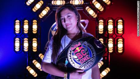 Edra poses with a BC One winner's belt.