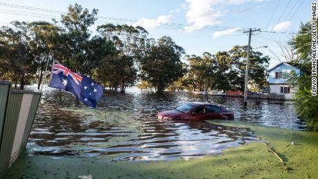 A car half submerged in a flood on March 24, 2021 in Sydney, Australia after days of continuous rain.