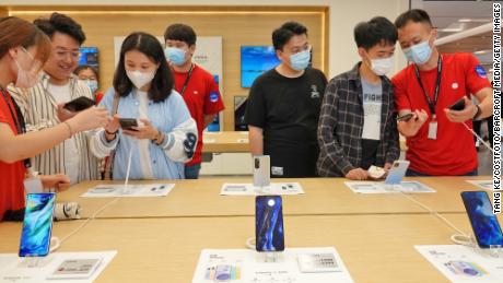 Customers buying phones at a Xiaomi store in Yantai, Shandong province, China, in September.