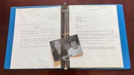 A picture of Michelle Watts and her mother Jessie Monis lays on top of a handmade cookbook that Monis made for her children in 1987. (Courtesy Michelle Watts)