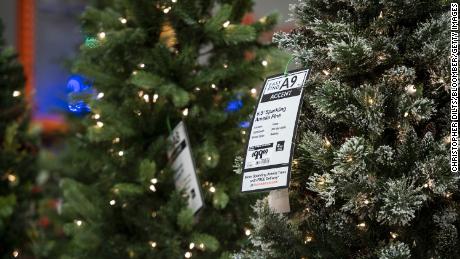 Christmas trees are displayed for sale at a store in Chicago, Illinois, in November 2020. 