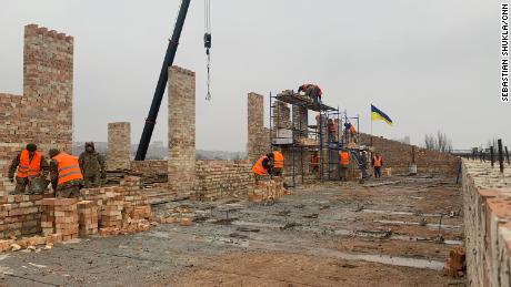 Construction of a housing facility in the port of Berdyansk has been underway since September.  The Ukrainian military says it has accelerated construction and crews are now working several days a week.