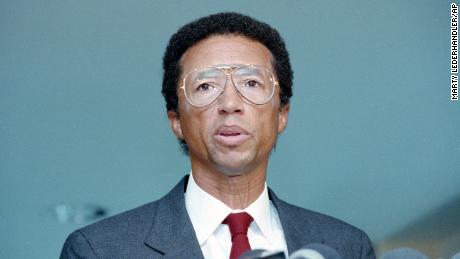 FILE - In this April 8, 1992 file photo, former tennis star Arthur Ashe gives a news conference in New York to announce he has AIDS. Ashe, who was the first black man to win one of tennis&#39; Grand Slam tournaments, said he contracted the HIV virus through a blood transfusion during a 1983 heart operation and learned of his infection in 1988. (AP Photo/Marty Lederhandler)