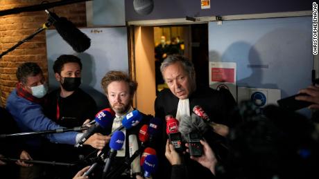 Benzema&#39;s lawyers Sylvain Cormier, right, and Antoine Vey answer reporters after the verdict.