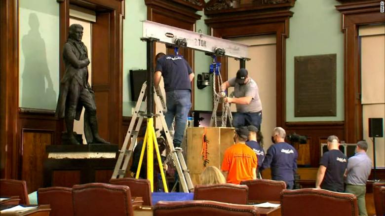 A statue of Thomas Jefferson is removed from New York City Hall after 187 years