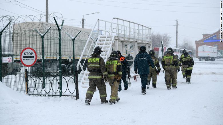 At least 11 dead, dozens trapped in Russian mining accident