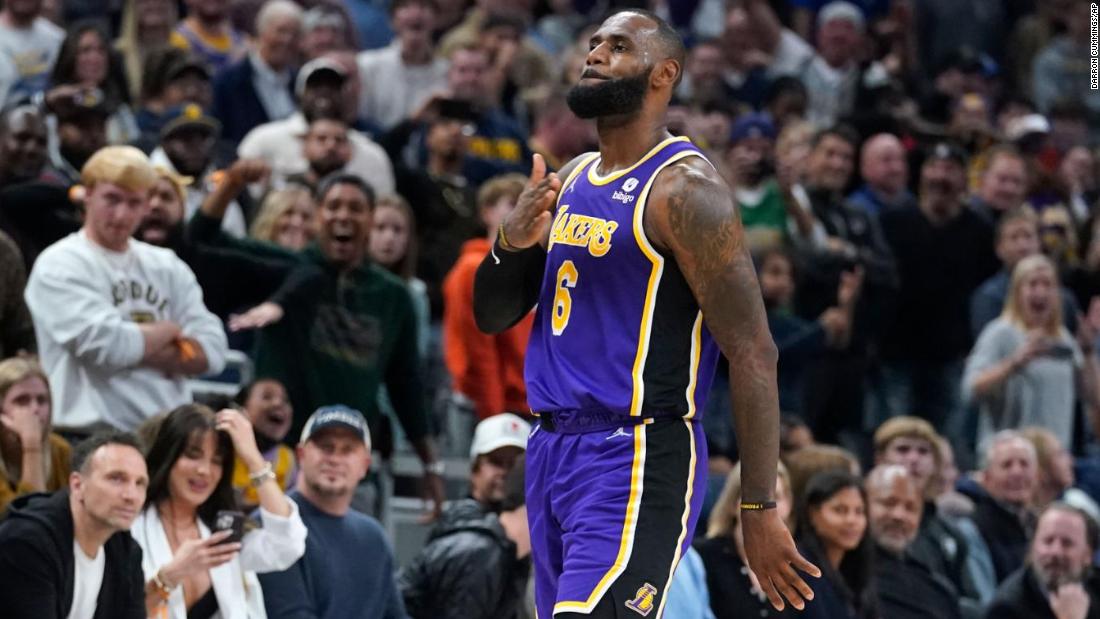 LeBron James gets fans ejected from courtside on return and hits clutch 3 in Lakers' OT win - CNN