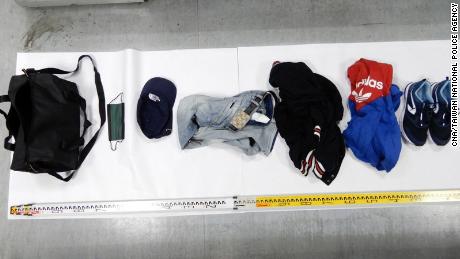 The clothes used are displayed by the police to avoid being tracked by the suspect.  Photo courtesy of Police