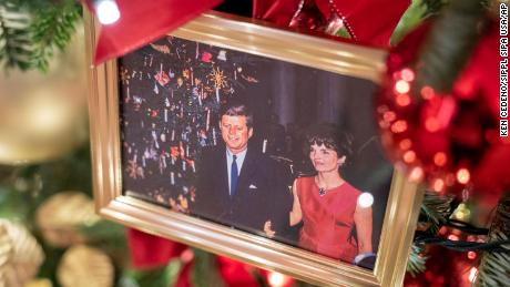 A photo of former United States President John F. Kennedy and First Lady Jaqueline Kennedy is displayed on a Christmas tree in the state Dining Room of the White House.