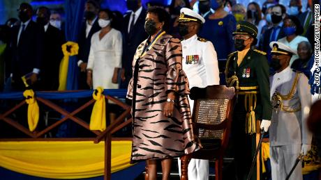 Barbados&#39;s new president, Sandra Mason, stands after being sworn in on Tuesday. 