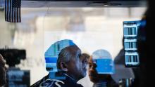 A trader works on the floor of the New York Stock Exchange (NYSE) at the start of trading on Monday following Friday&#39;s steep decline in global stocks over fears of the new omicron Covid variant discovered in South Africa on November 29, 2021 in New York City. 