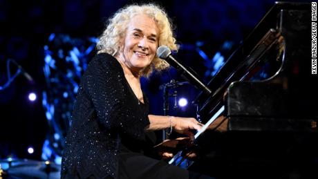 CLEVELAND, OHIO - OCTOBER 30:  Inductee Carole King performs onstage during the 36th Annual Rock &amp; Roll Hall Of Fame Induction Ceremony at Rocket Mortgage Fieldhouse on October 30, 2021 in Cleveland, Ohio. (Photo by Kevin Mazur/Getty Images for The Rock and Roll Hall of Fame )