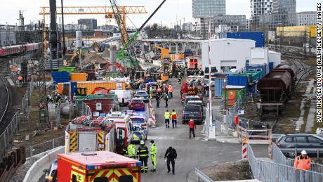 Emergency crew gather at the explosion site near Donnersbergerbrücke railway station on Wednesday. 