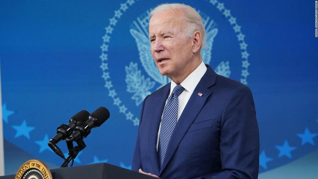 A gravelly voiced President Biden says he has a cold