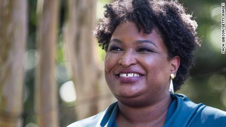 Former US Representative and voting rights activist Stacey Abrams is introduced before speaking at a Souls to the Polls rally supporting Former Virginia Gov. Terry McAuliffe on October 17, 2021 in Norfolk, Virginia. 