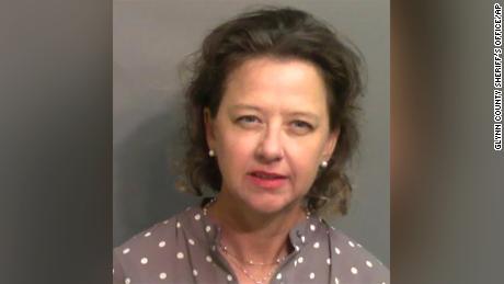 This jail booking photo provided by Glynn County Sheriff&#39;s Office, shows Jackie Johnson, the former district attorney for Georgia&#39;s Brunswick Judicial Circuit, after she turned herself in to the Glynn County jail in Brunswick, Ga, on Wednesday, Sept. 8, 2021.  A grand jury indicted Johnson on charges of violating her oath of office and obstructing police in her handling of the February 2020 killing of Ahmaud Arbery. The indictment accuses Johnson of using her position to try to shield Arbery&#39;s killers from prosecution. She has denied any wrongdoing.  (Glynn County Sheriff&#39;s Office via AP)