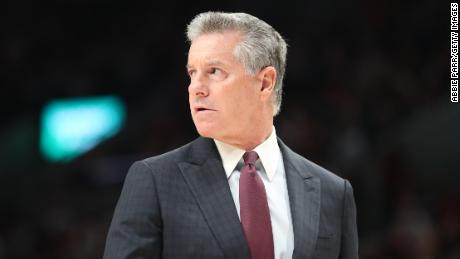 Neil Olshey looks on during a game between the Portland Trail Blazers and San Antonio Spurs.