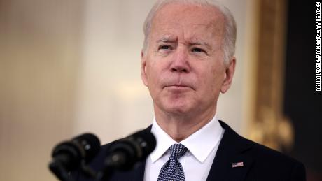 Biden announces plans for free at-home testing as he assures vaccinated Americans they don't need to scrap vacation plans