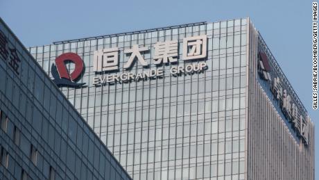 Evergrande stock falls 20% to new record low as default fears re-emerge