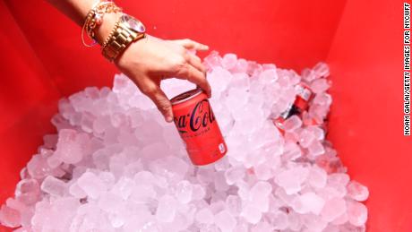 تحت رهبری Quincey، این شرکت Coke Zero را به Cola-Cola Zero Sugar تغییر نام داد، دستور غذا را تغییر داد و طراحی قوطی را به روز کرد.