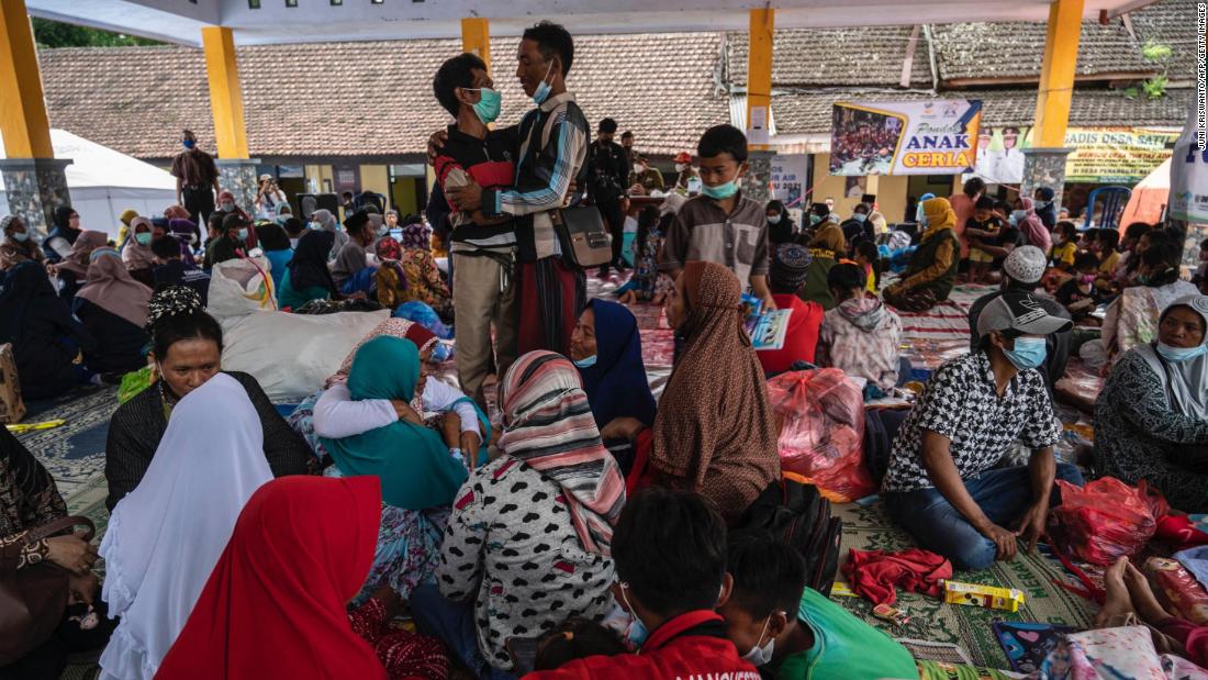 Villagers gather at a shelter in Sumberwuluh.