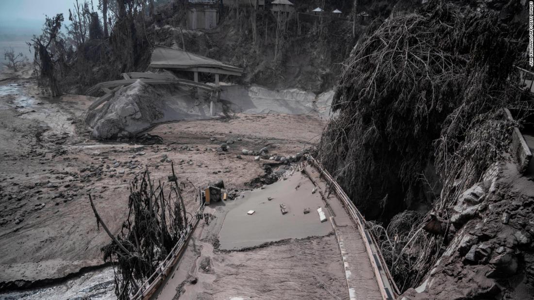 An area of Sumberwuluh is covered in ash on Sunday.