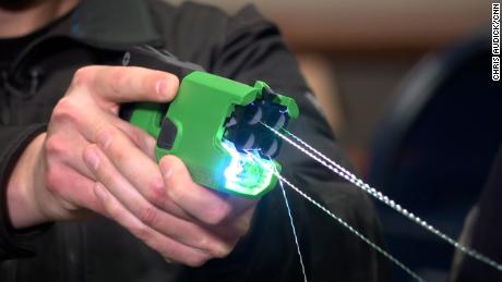 New Tasers carried by LAPD officers are made to look and feel different from service weapons.