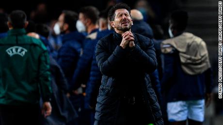 Diego Simeone reacts after Carrasco is shown a red card.