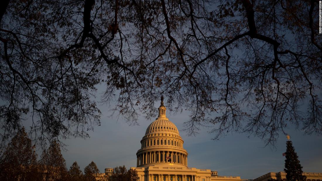 Aide arrested after bringing gun to US Capitol complex