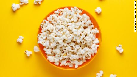 You can use an air blower to reduce the amount of oil used to make popcorn, said dietitian Julian Chamoun. 
