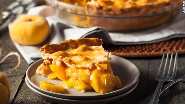 This homemade warm peach pie is ready to eat. 