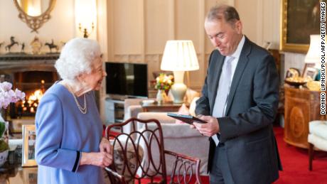 The Queen presents organist Thomas Trotter with the Queen&#39;s Medal for Music, during an audience at Windsor Castle.