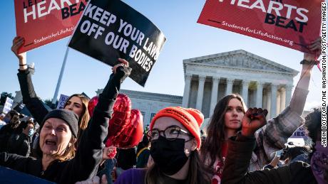 Supreme Court Allows Texas Abortion Law To Continue, But Says Providers Can Sue