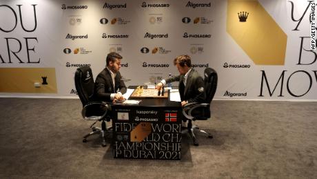Ian Nepomniachtchi, left, and Magnus Carlsen compete during last year&#39;s championship. 