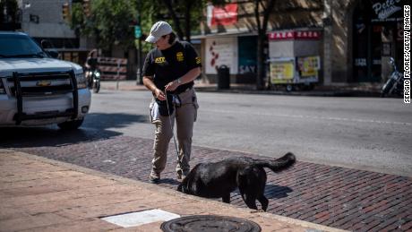  An ATF K9 unit surveys the area near the scene of a mass shooting on June 12, 2021, in Austin, Texas. Austin has recorded 88 homicides so far this year. 